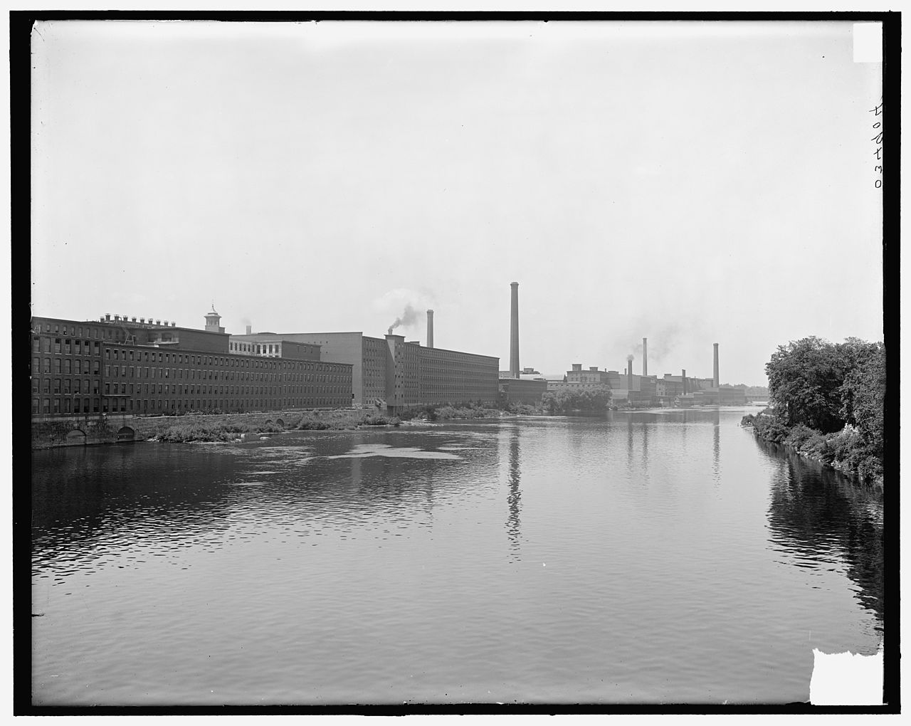 A view of the factories along the Merrimack River, around 1900.